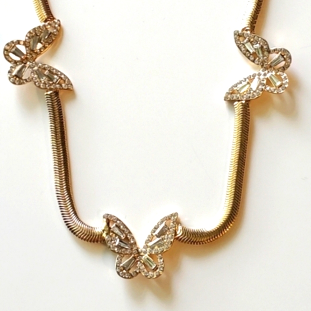 Rhinestone Butterflies On a Gold Herringbone Necklace